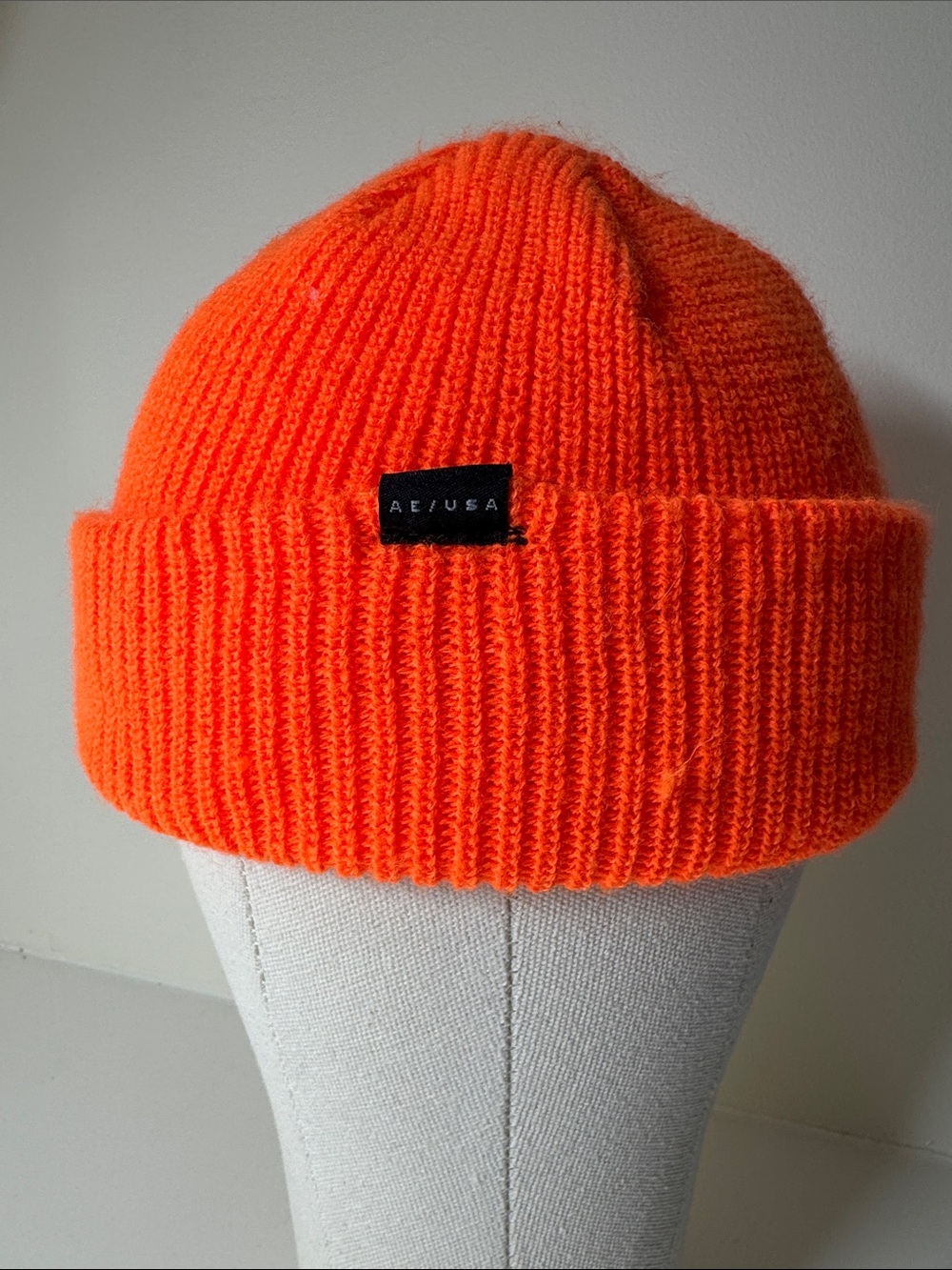 American Eagle bright orange knit beanie.